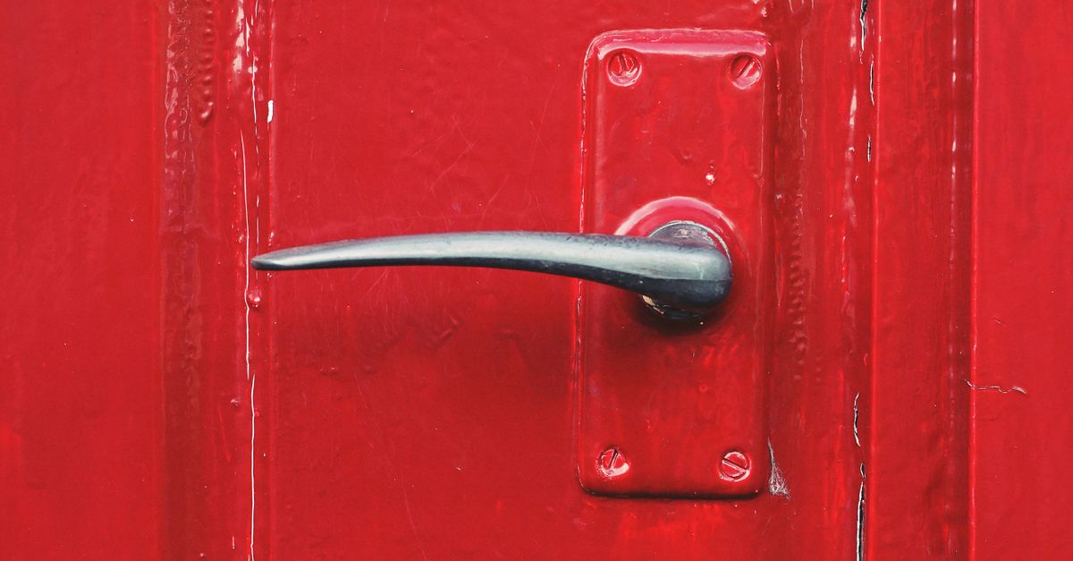 locksmith unlocking front door — Glen Cove Locksmiths